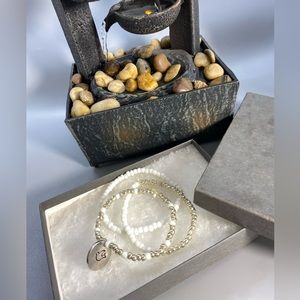 Beaded bracelet with charm